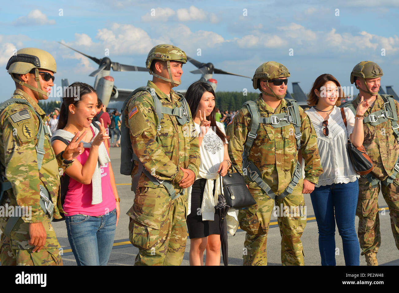 U S Soldiers With The 1st Battalion 1st Special Forces Group Airborne Pose With Visitors During The Japanese American Friendship Festival At Yokota Air Base Japan Sept 15 After Parachuting Over The Airfield U S Soldiers With The 1st Battalion 1st Special Forces Group Airborne Pose With Visitors During The Japanese American Friendship Festival At Yokota Air Base Japan Sept 15 After Parachuting Over The Airfield