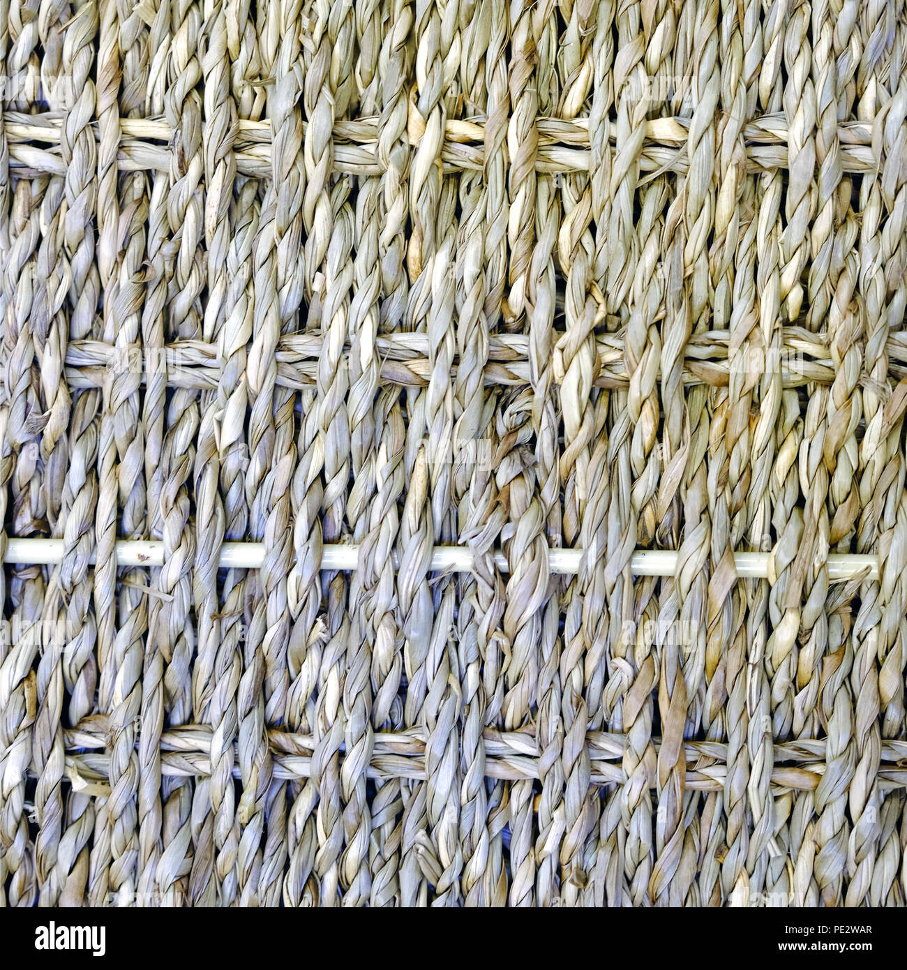 A woven Mat of reeds. The texture of dry cane. Light yellow Stock Photo ...