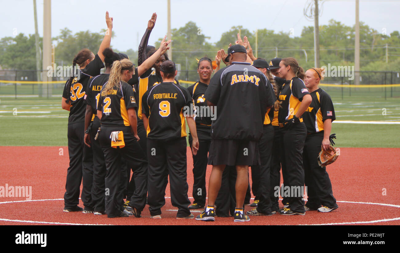 Members of the U.S. Army women's softball team congratulate each other ...