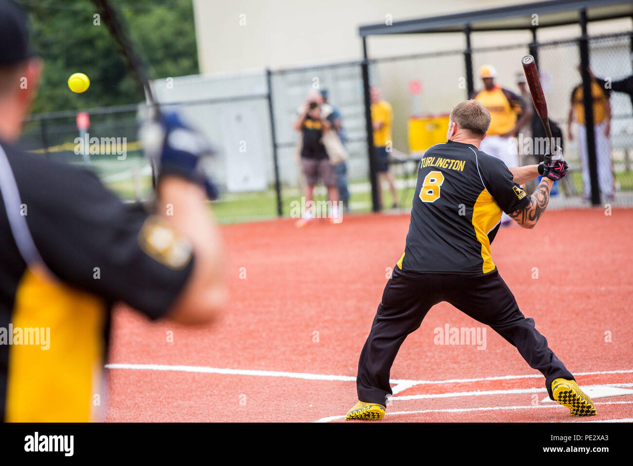 U.S. Army Staff Sgt. Kenneth Turlington, an infielder for the U.S. Army men's softball team, prepares to swing during the 2015 Armed Forces Softball Tournament at the Harry Agganis Softball Field on Camp Lejeune, N.C., Sept. 24, 2015. 160 athletes representing the U.S. Army, Marine Corps, Navy, and Air Force competed during a weeklong softball tournament hosted by Marine Corps Community Services. (U.S. Marine Corps photo by Sgt. Christopher Q. Stone, MCIEAST-MCB CAMLEJ Combat Camera/Released) Stock Photo