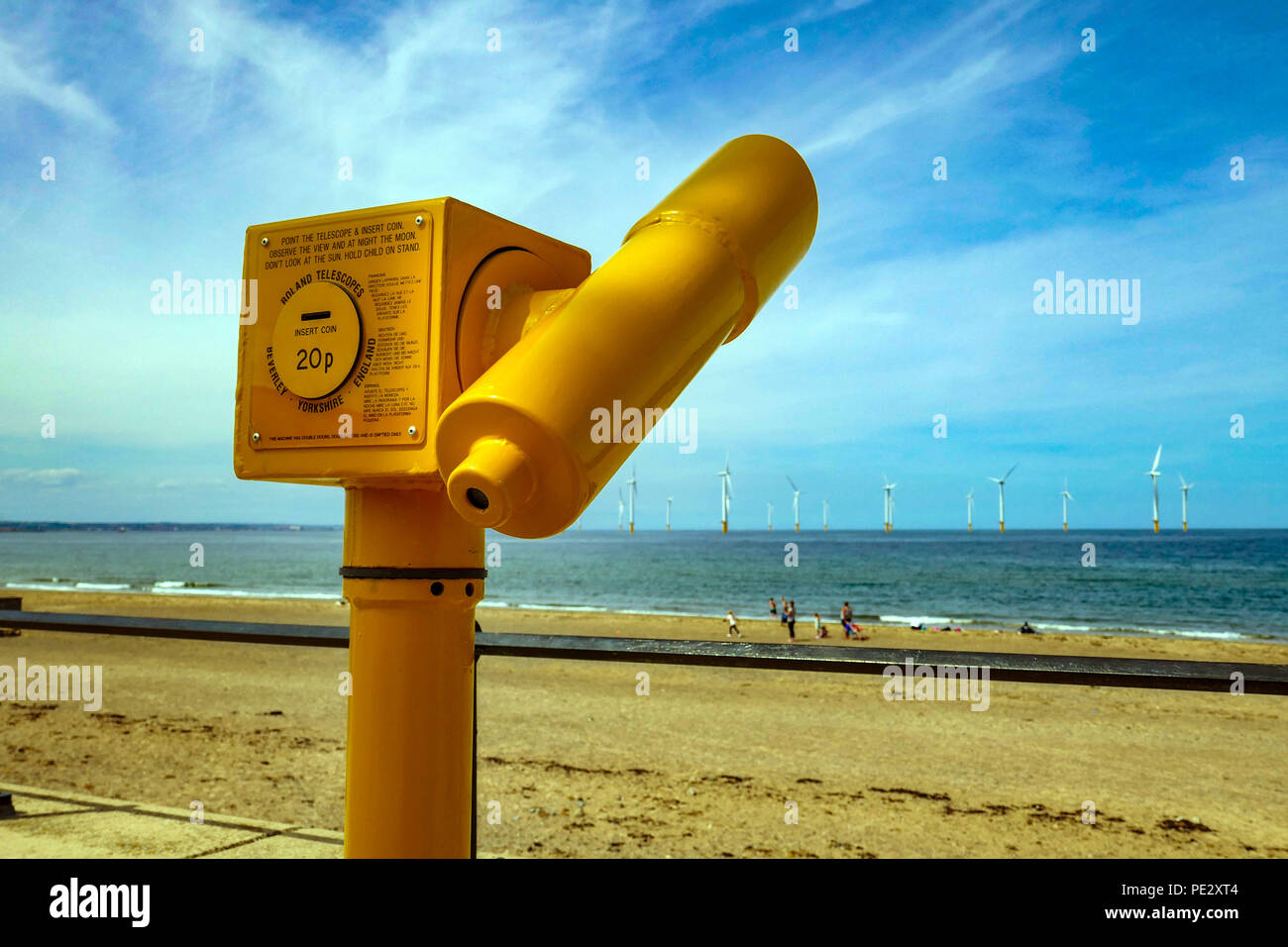 Pay to view yellow telescope, Redcar, North Yorkshire, England, UK, seaside, holiday Stock Photo