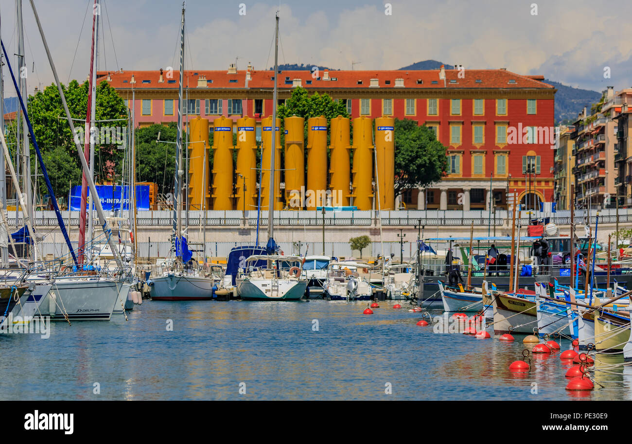 Nice, France - May 26, 2018: Old classic wooden boats and luxury yachts in Lympia port of Nice, Côte d'Azur Stock Photo