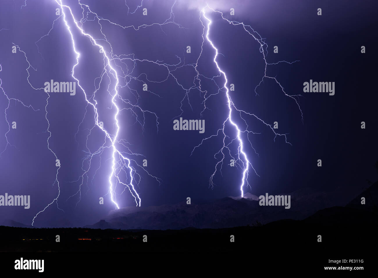 Lightning bolt strike in a storm Stock Photo