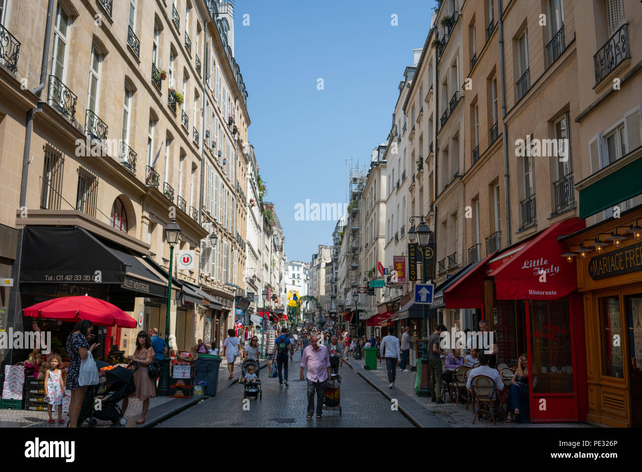 Paris France, 14 July 2018: Rue Montorgueil pedestrian street view in Paris France during summer with tourists and parisian people Stock Photo