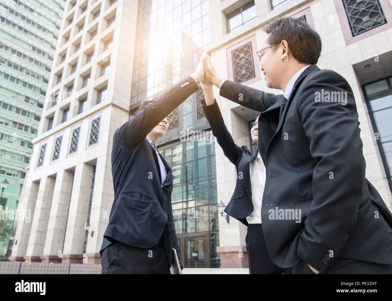 business people team showing fist on sky, partner and fighting for ...