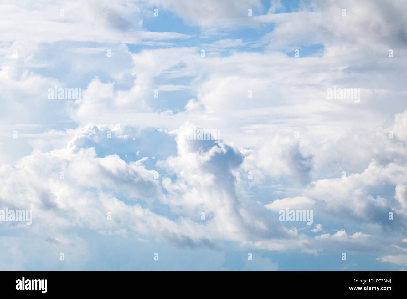 Fluffy clouds on sunny day. Sky background Stock Photo - Alamy