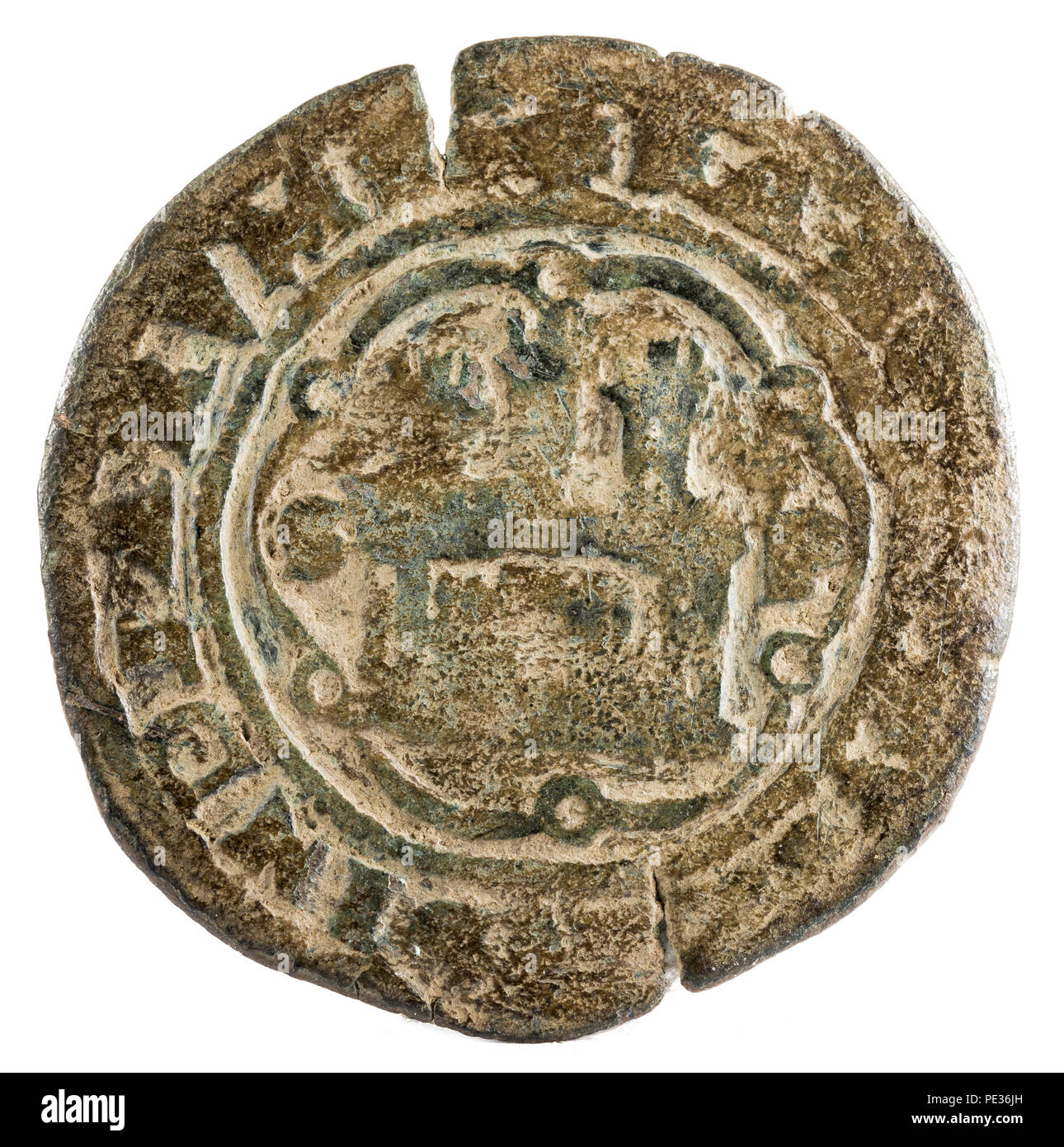 Ancient Spanish copper coin of the King Carlos I. Coined in Santo Domingo. 4 maravedis. Obverse. Stock Photo