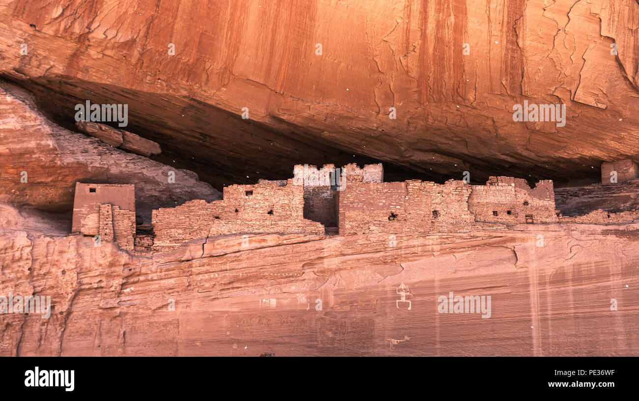 Historic native anasazi cave dwellings built in a sandstone cliff in the Canyon de Chelly