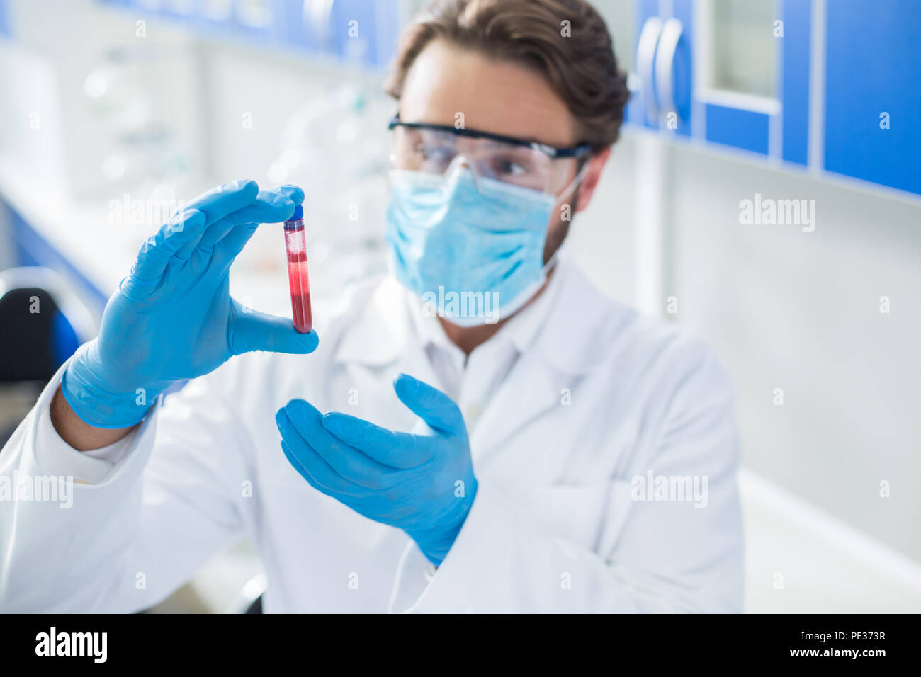 Blood test. Selective focus of a blood sample being used in the medical
