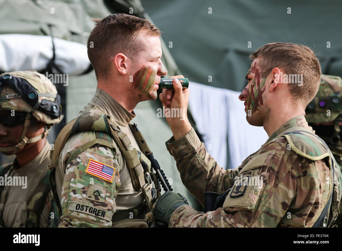 U.S. Army Soldiers of the 54th Brigade Engineer Battalion apply ...