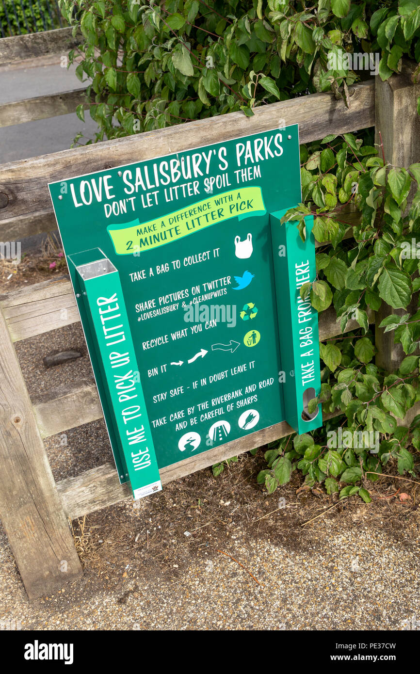 Litter bag station at the entrance to Salisbury public park Stock Photo