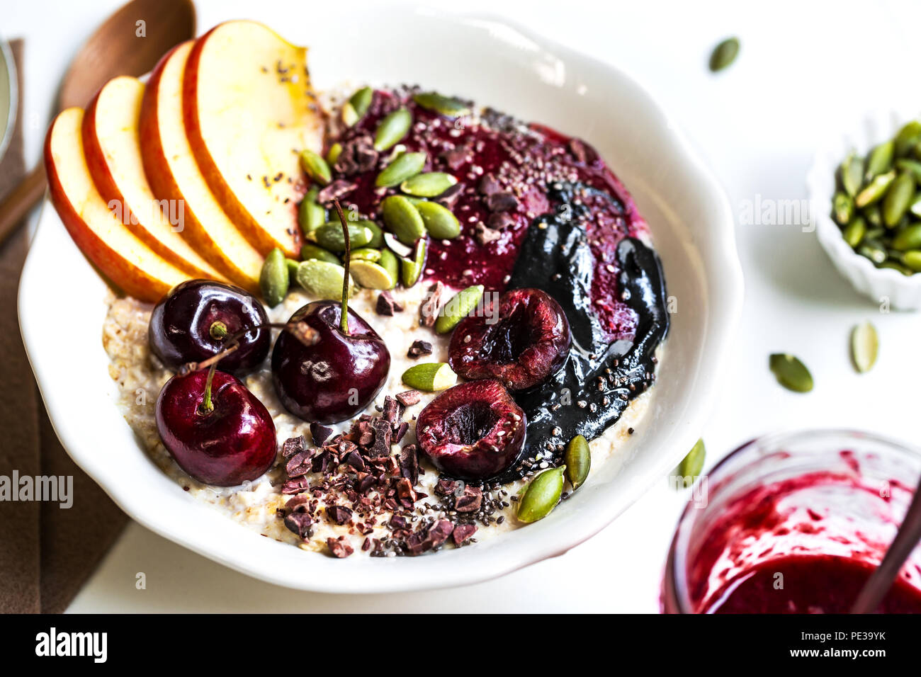Overnight Oat with Cherry,Black Sesame Butter,Berries compote,Chia seed