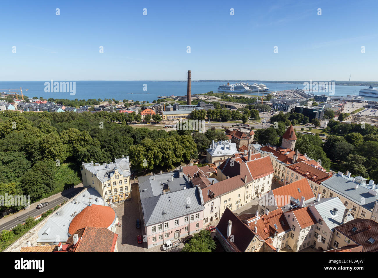 Old buildings at the Old Town, harbor and downtown in Tallinn, Estonia, viewed from above on a sunny day in the summer. Stock Photo