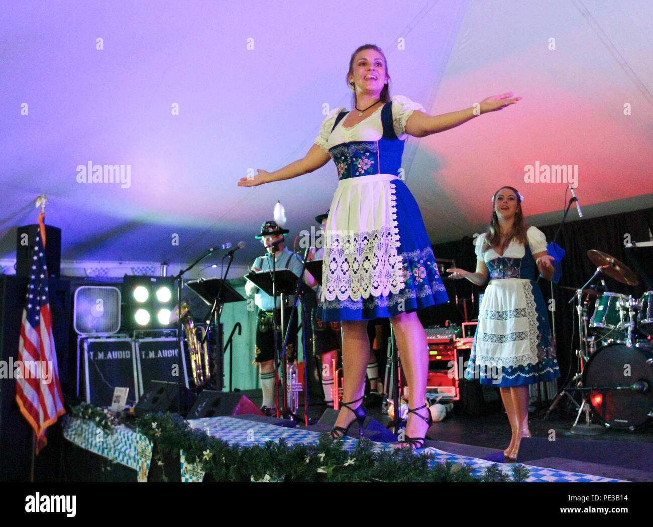 Members of the Swinging Bavarians entertain guests with yodeling and