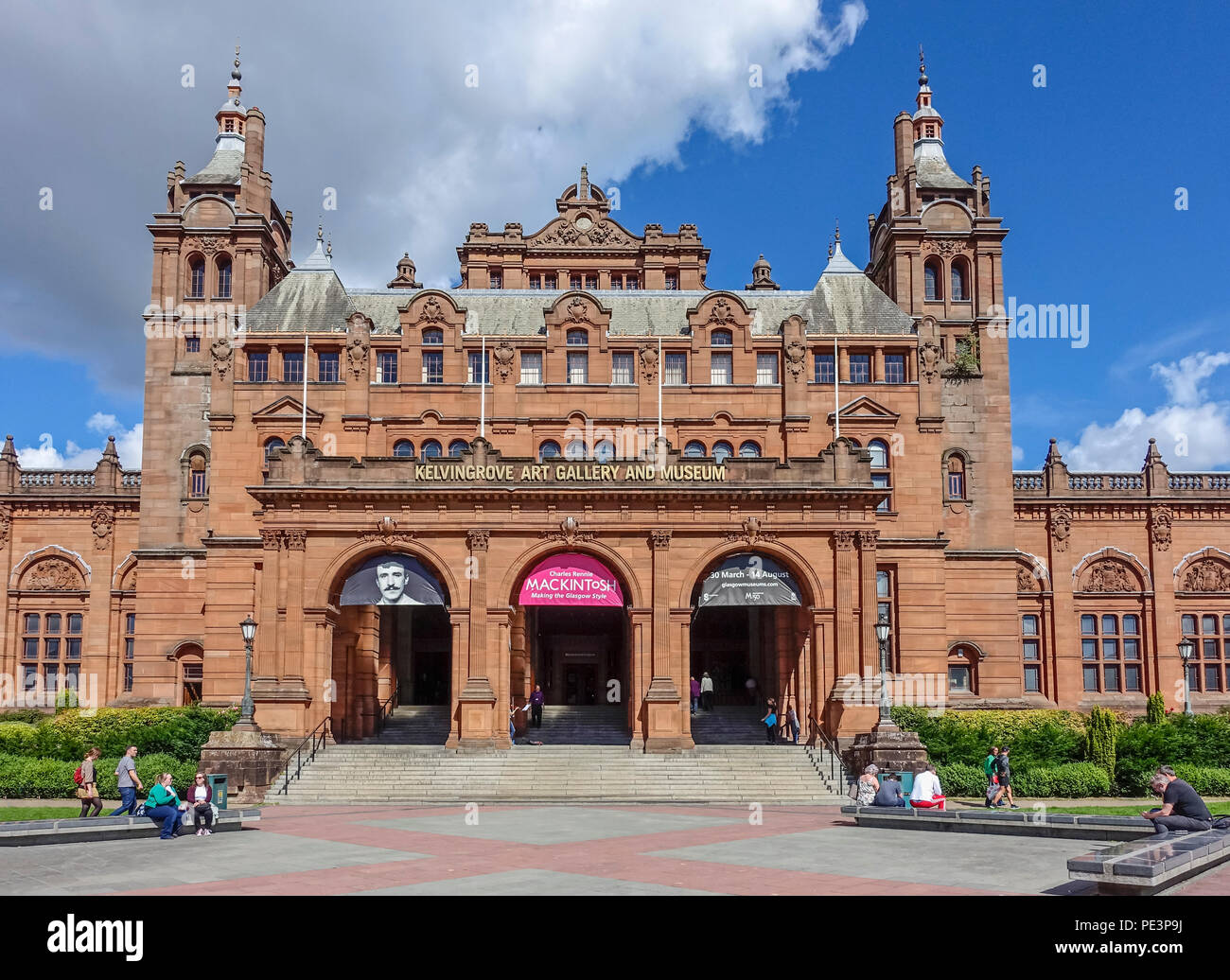 Frontage of Kelvingrove Art Gallery and Museum in Argyle Street Glasgow with advertisements and promotion of Charles Rennie Mackintosh exhibition 2018 Stock Photo