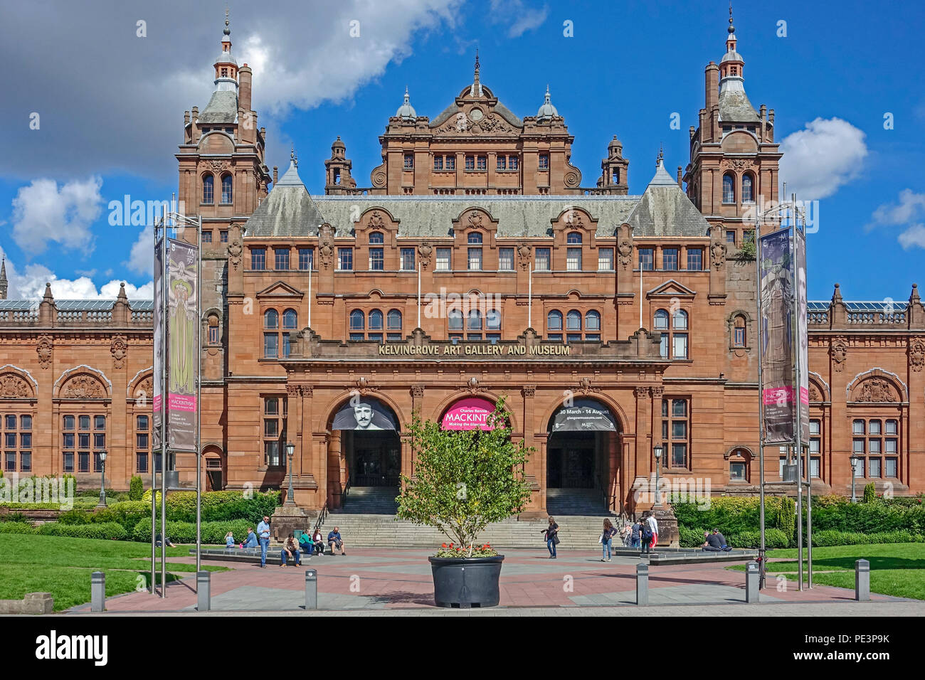 Frontage of Kelvingrove Art Gallery and Museum in Argyle Street Glasgow with advertisements and promotion of Charles Rennie Mackintosh exhibition 2018 Stock Photo