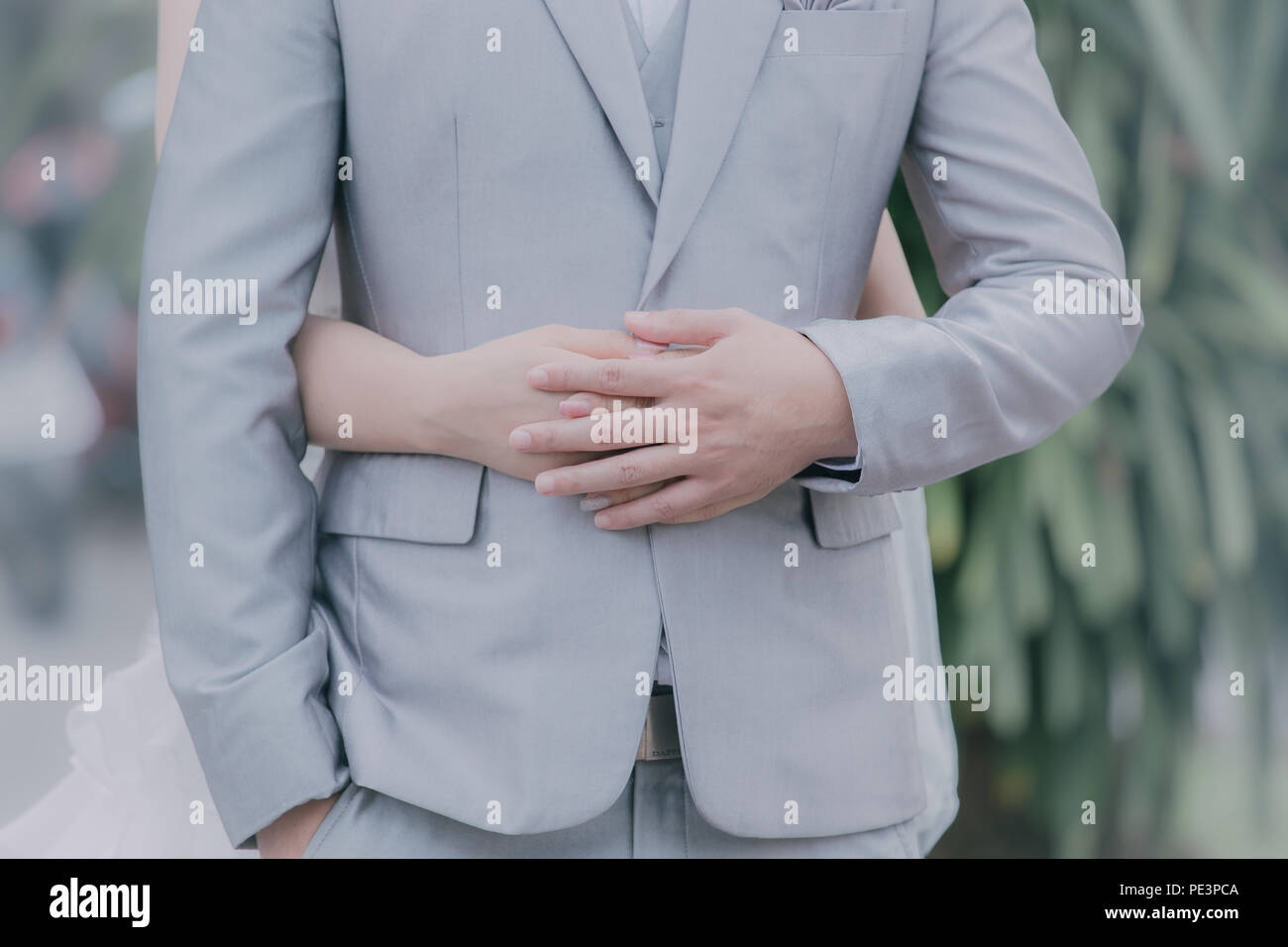 Bride and Groom Married embraced as a symbol of love and happiness. Stock Photo