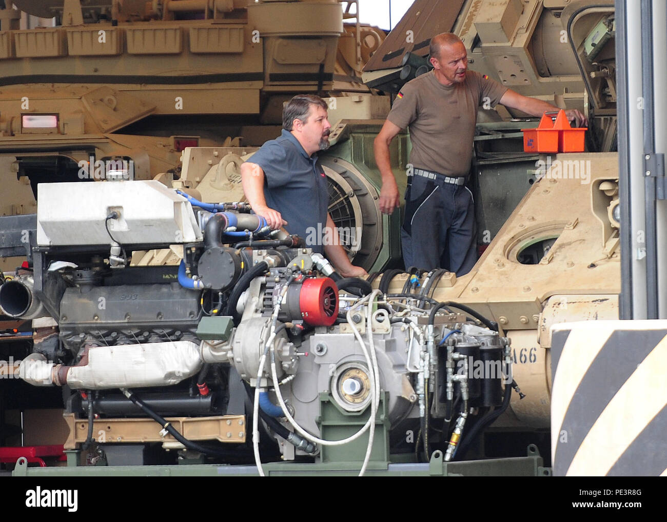 Contractors from the Coleman Worksite conduct maintenance on a Bradley ...