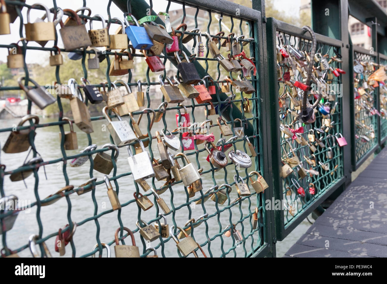 hundreds of "love locks" on the footbridge on river Limmat at Zurich