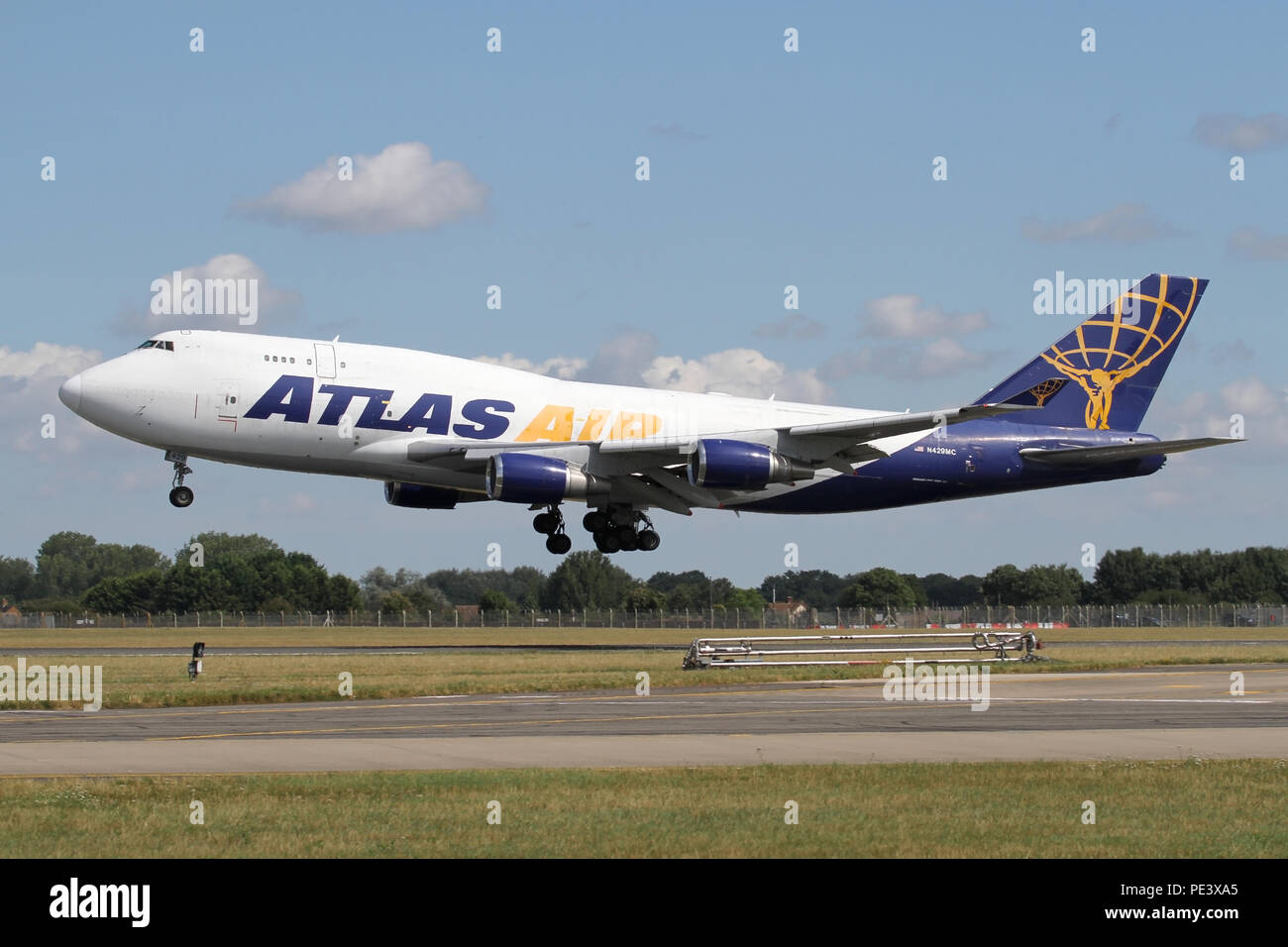 Boeing 747-400F freighter operated by Atlas Air landing at RAF Mildenhall on a military charter. Stock Photo