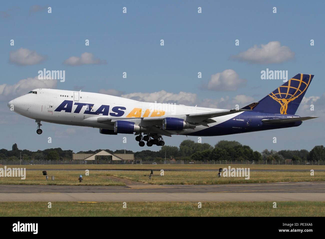 Boeing 747-400F freighter operated by Atlas Air landing at RAF Mildenhall on a military charter. Stock Photo