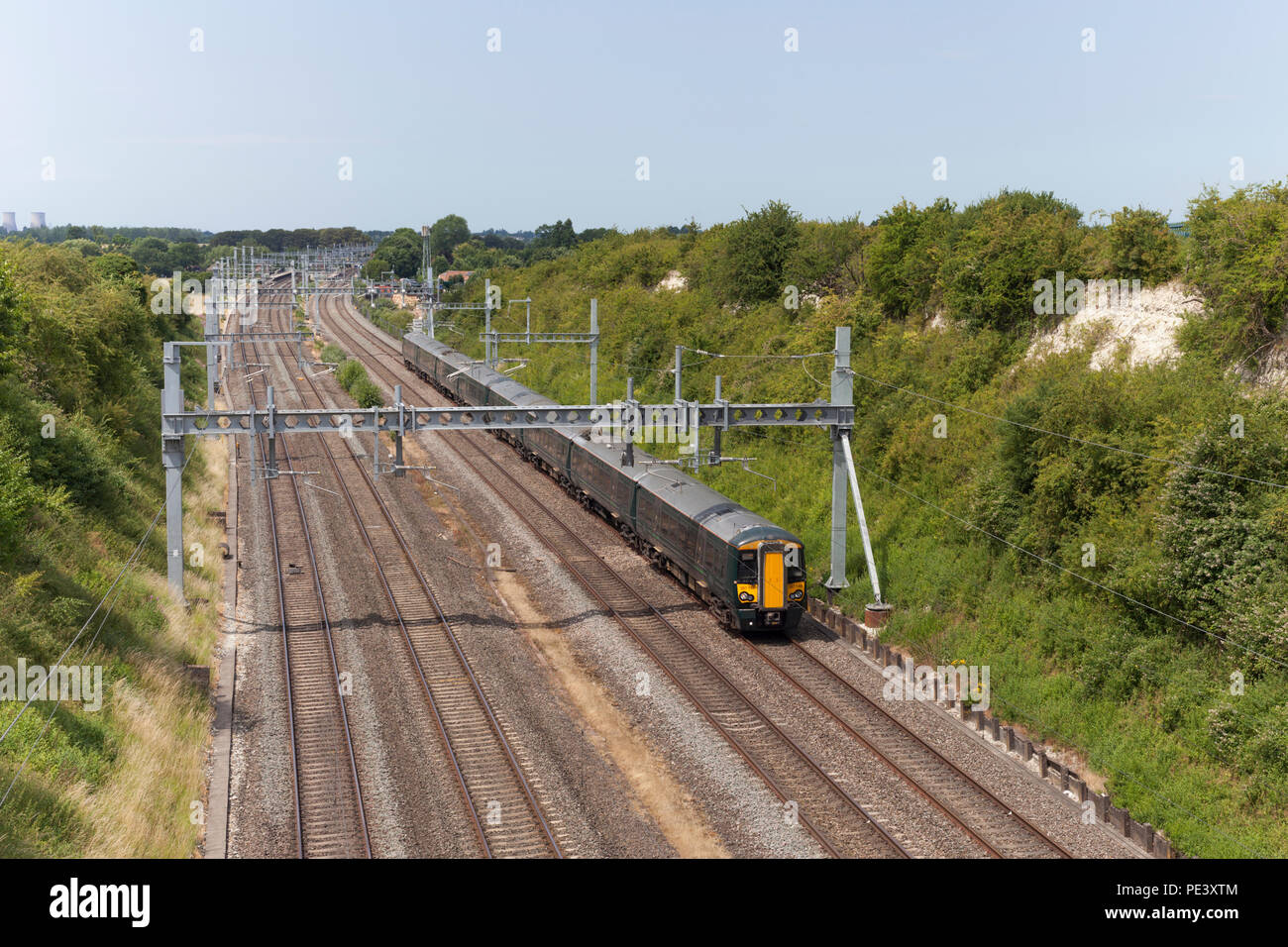 A First Great Western Railway class 387 electric commuter train passing Cholsey on the electrified great western main line Stock Photo