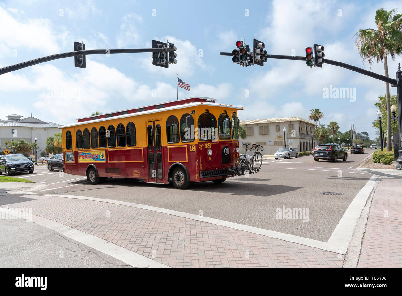 Dunedin, Florida, USA. Trolley bus with bike rack on the front on Main Street, Dunedin, Florida, Stock Photo