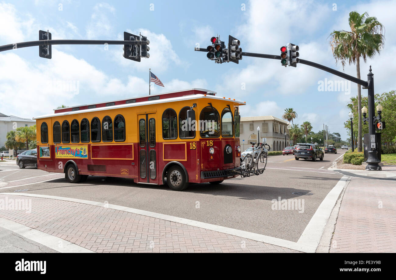 Dunedin, Florida, USA. Trolley bus with bike rack on the front on Main
