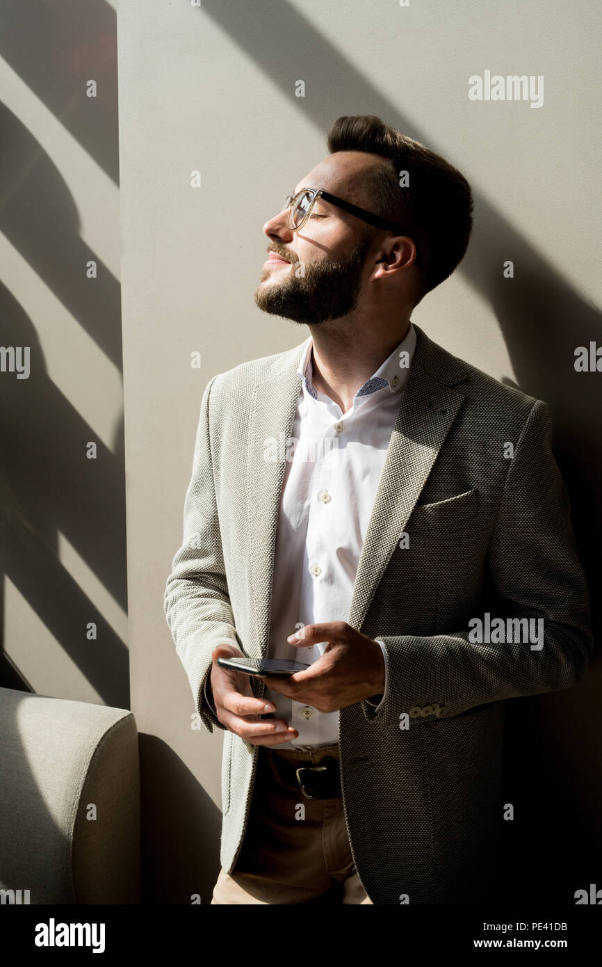 Pensive businessman at office Stock Photo