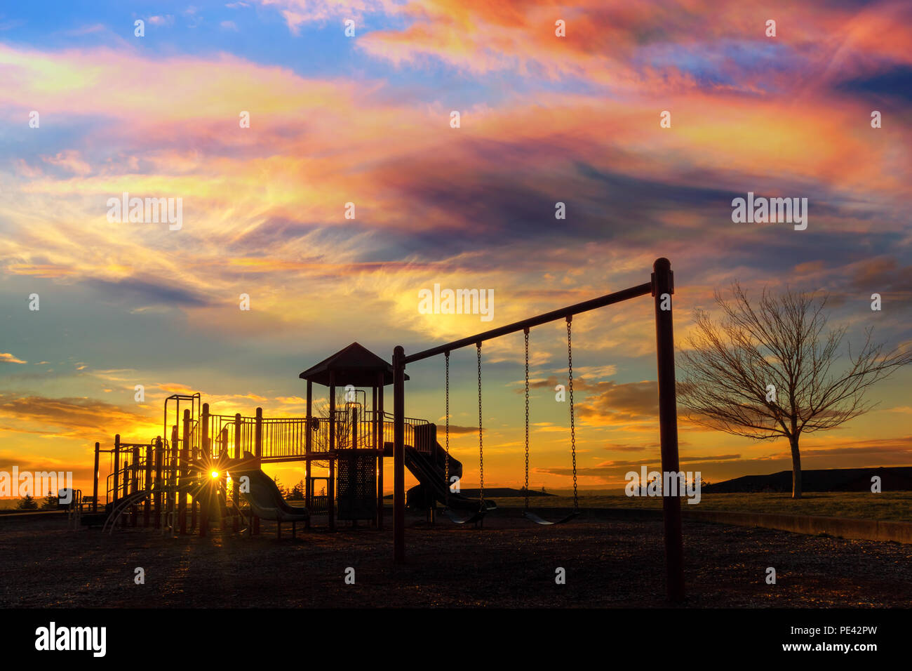 Children playground at Altamont Park on Mount Scott in Happy Valley Oregon during sunset Stock Photo