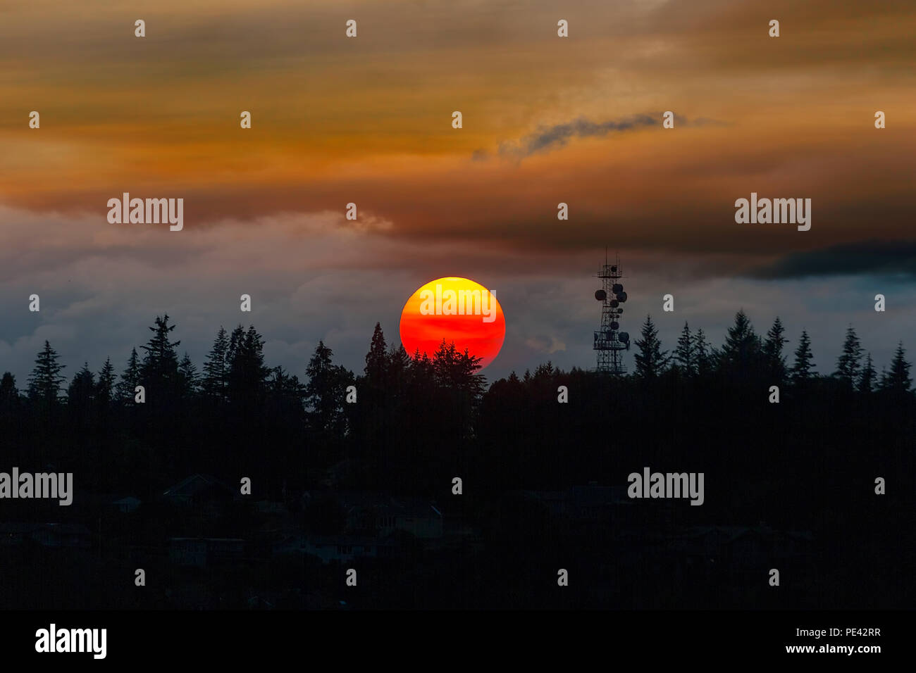 Smokey sunset sky over Mount Scott in Oregon Stock Photo