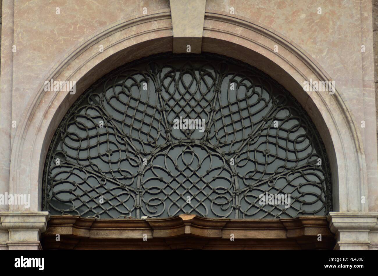 Beautiful metal design above the entrance door of the St. James's Cathedral, Dom zu St. Jakob,historic district, Innsbruck, Tyrol, Austria, Europe Stock Photo