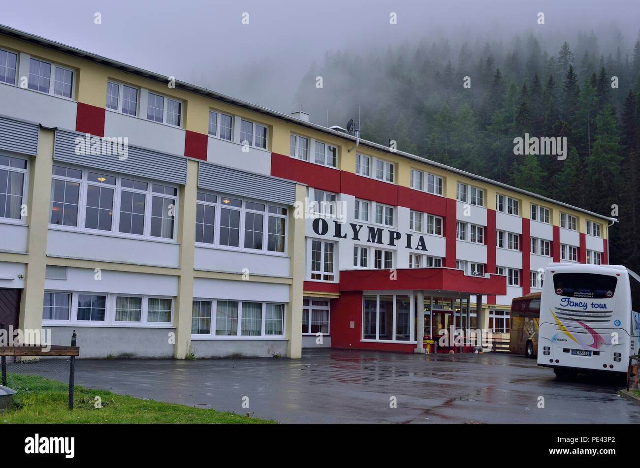 Exterior View of Hotel Olympia against backdrop of Alps Mountain Range, Axamer Lizum 2, Axams, Austria, Europe Stock Photo