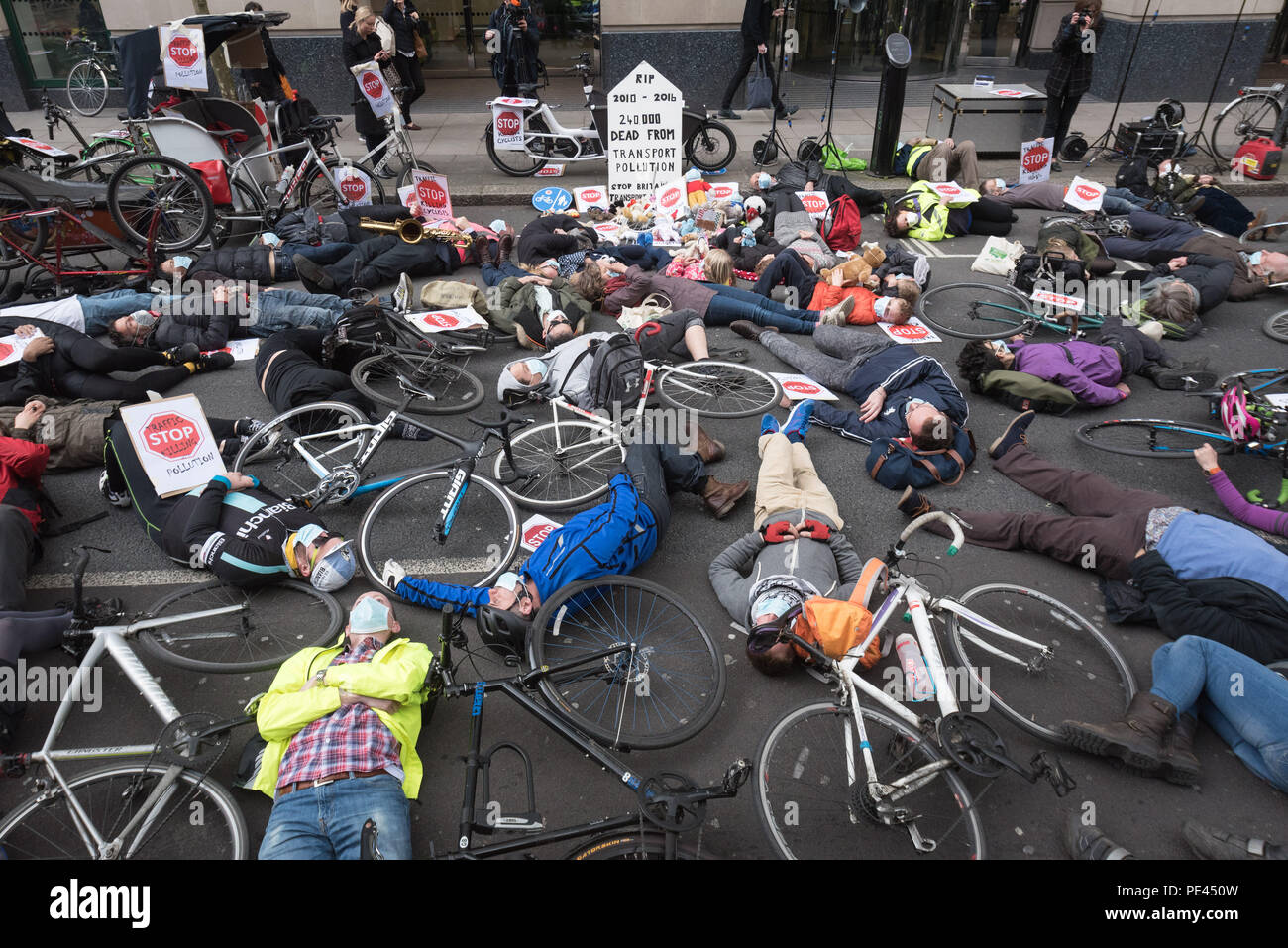 Department for Transport, Horseferry Road, London, UK. 27th April 2016.  A Stop Killing Cyclists Transport Pollution Die-In protest is held outside th Stock Photo
