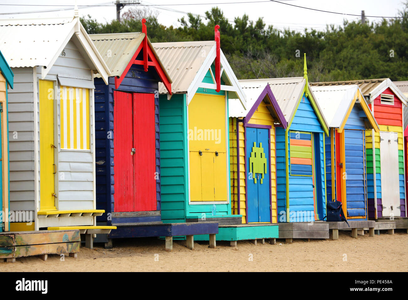 Colourful beach huts on Dendy Street Beach, Brighton, City of Bayside, Victoria, Australia Stock Photo