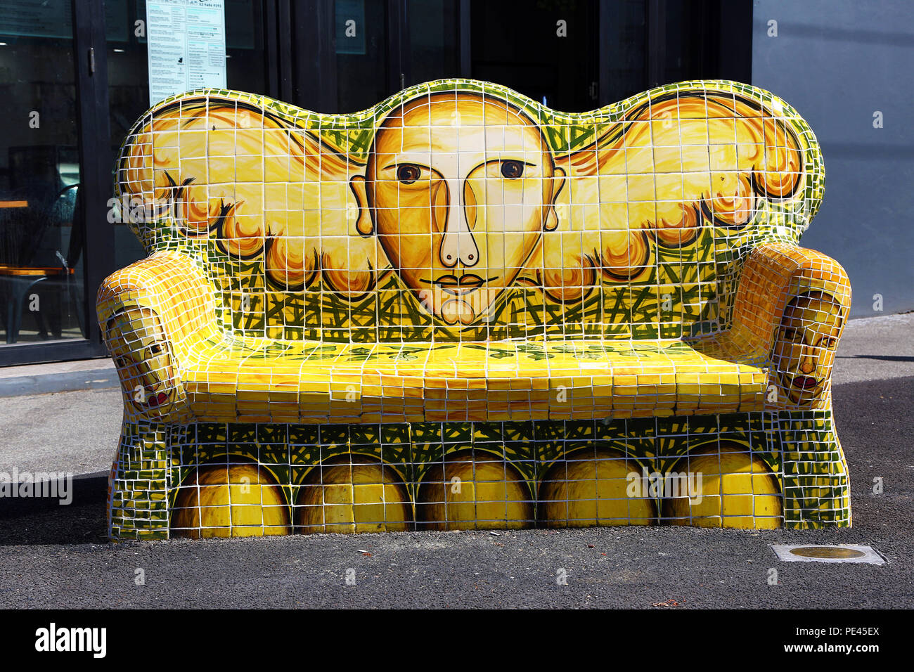 Decorated stone sofa on Brunswick Street, Melbourne, Victoria, Australia Stock Photo