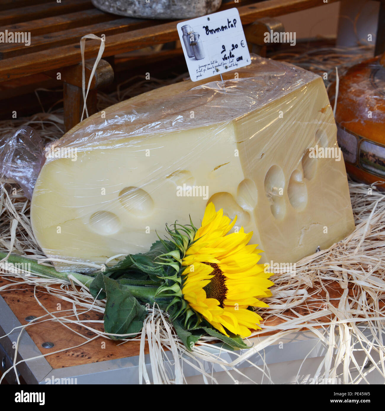 Swiss Emmental cheese on French market stall Stock Photo Alamy