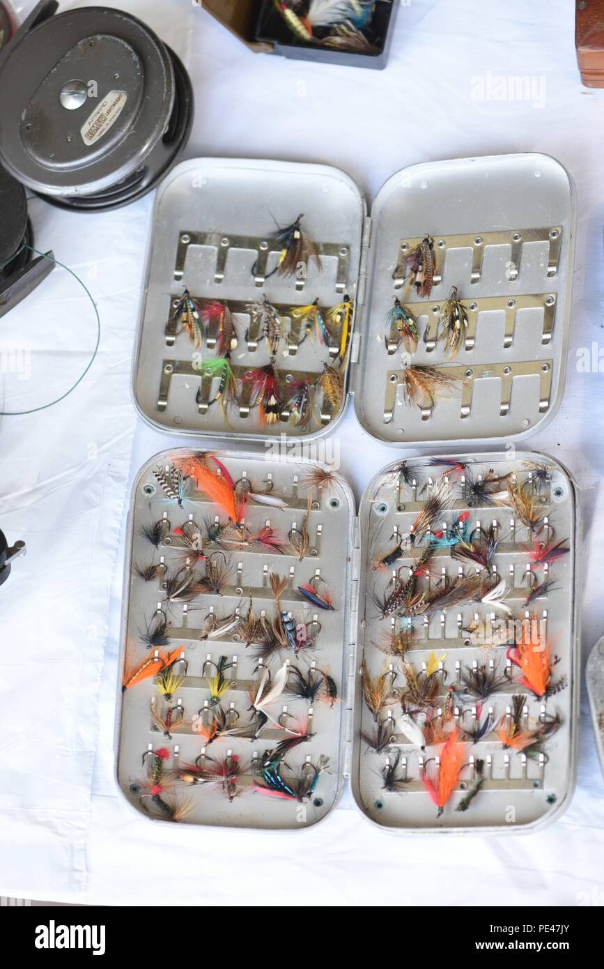 A collection of fishing flies and other fly fishing equipment. Hawkhurst, Kent, UK. Stock Photo