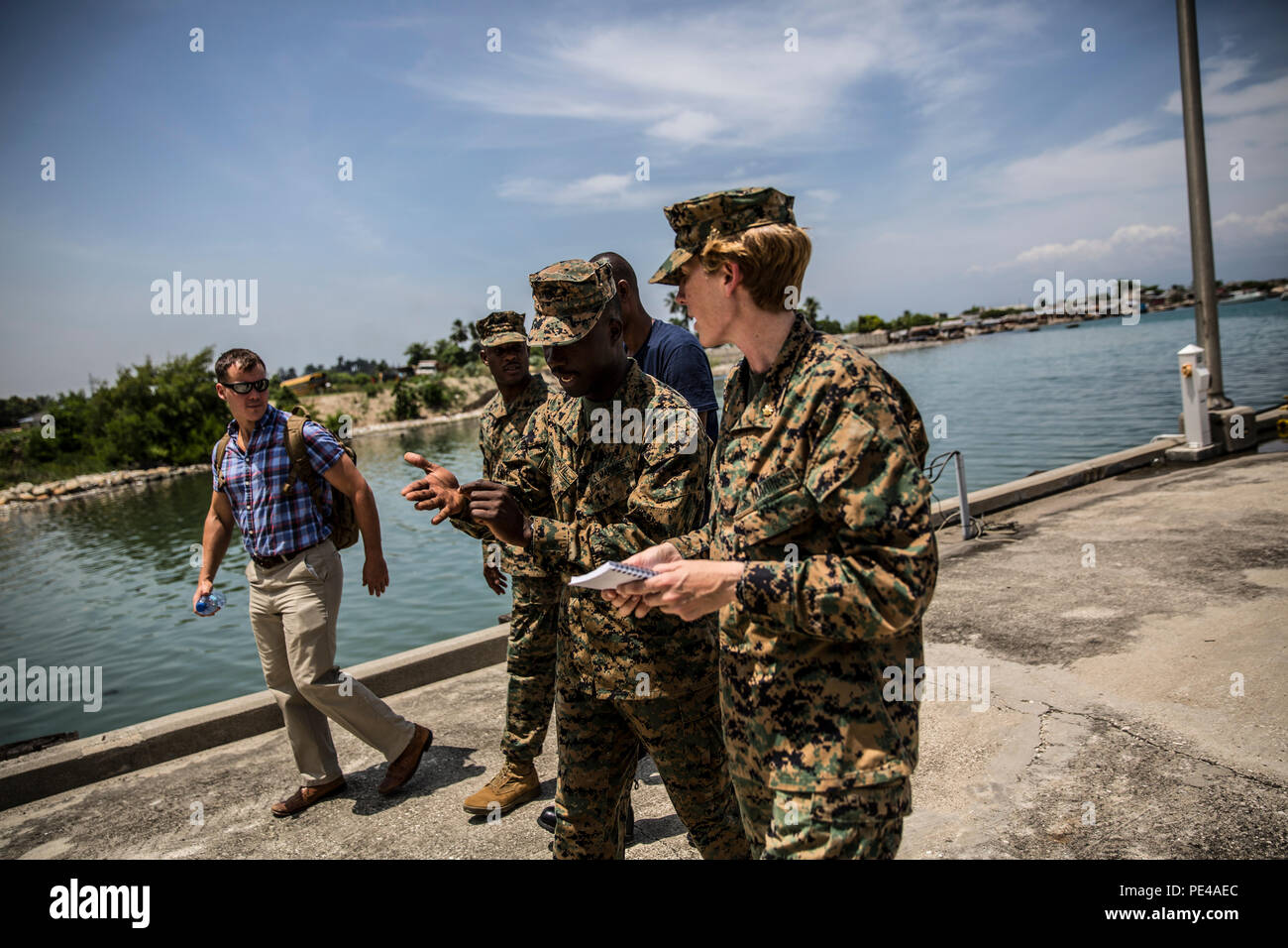 U.S. Marines assigned to 4th Civil Affairs Group conduct a site ...