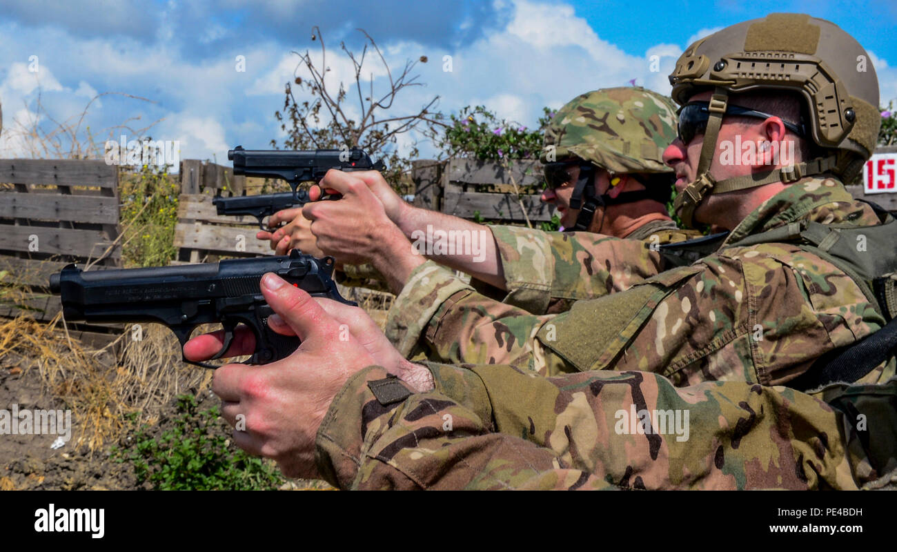 Airmen assigned to the 3d Combat Camera Squadron, fire at range targets  during Advanced Weapons and Tactics Training, Sept. 4, 2015, in Converse,  Texas. The two-week course teaches combat camera Airmen shooting