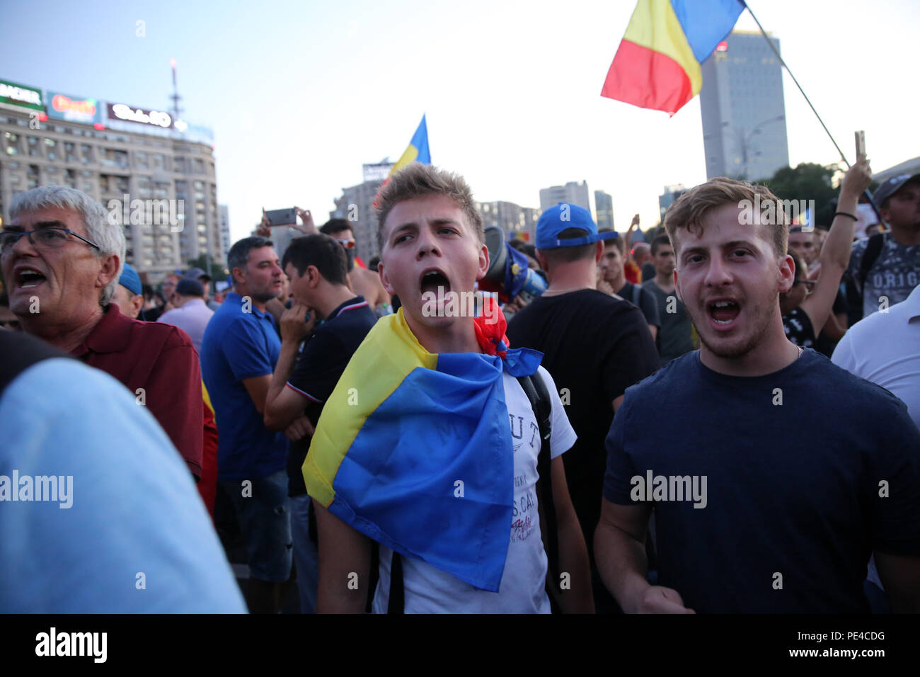 Bucharest, Romania - August 10, 2018: Tens of thousands of people are participating at violent anti-government protest in Bucharest. Over 400 people i Stock Photo