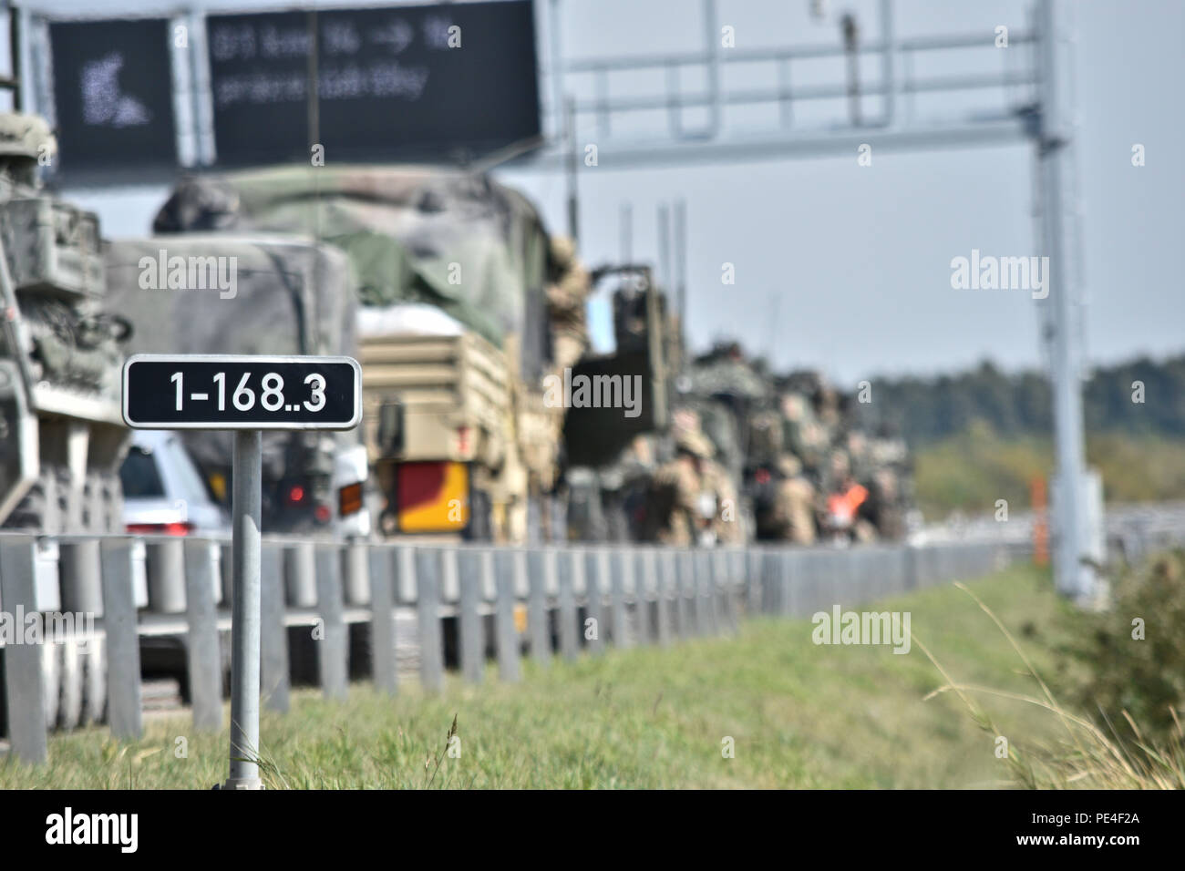 Troopers assigned to 4th Squadron, 2nd Cavalry Regiment, conduct a brief rest stop during vehicle convoy through local Czech Republic farmland while participating in Dragoon Crossing, a tactical road march starting out at Rose Barracks, Germany and continuing through the Czech Republic and the Slovak Republic ending in Hungary Sept. 13, 2015. The purpose of the exercise is to reassure NATO allies of the U.S. intent during Operation Atlantic Resolve while demonstrating interoperability and freedom of movement throughout Eastern Europe. (U.S. Army photo by Sgt. William A. Tanner/released) Stock Photo