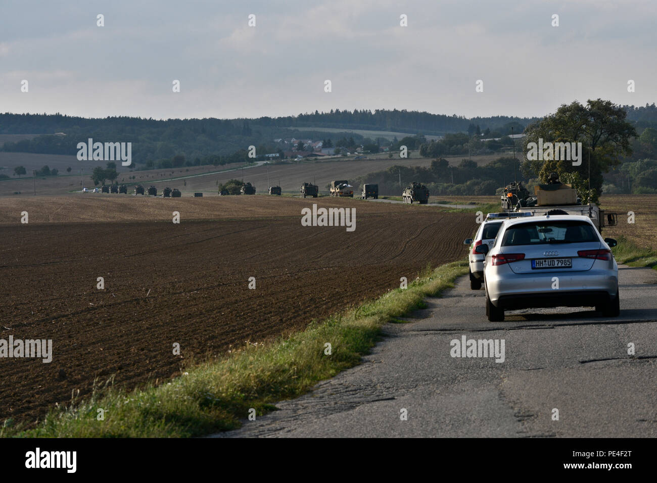Troopers assigned to 4th Squadron, 2nd Cavalry Regiment, conduct a vehicle convoy through local Czech Republic farmland during Dragoon Crossing, a tactical road march starting out at Rose Barracks, Germany and continuing through the Czech Republic and the Slovak Republic ending in Hungary Sept. 13, 2015. The purpose of the exercise is to reassure NATO allies of the U.S. intent during Operation Atlantic Resolve while demonstrating interoperability and freedom of movement throughout Eastern Europe. (U.S. Army photo by Sgt. William A. Tanner/released) Stock Photo