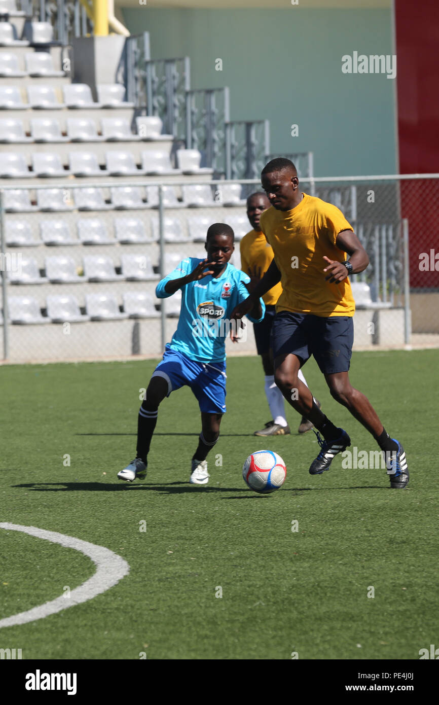 Haitian children play soccer in hi-res stock photography and images - Alamy
