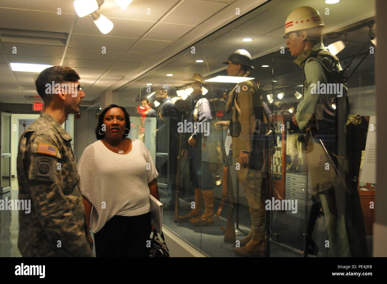 District of Columbia National Guardsman Army 2nd Lt. Jesse Searls escorts Marsha Coore-Lobban, Deputy Chief of Mission from the Jamaican embassy during a visit to the District of Columbia National Guard (DCNG) headquarters in Washington, D.C. Coore-Lobban is the Jamaican representative under the State Partnership Program between the Jamaican Defence Forces and DCNG. Stock Photo