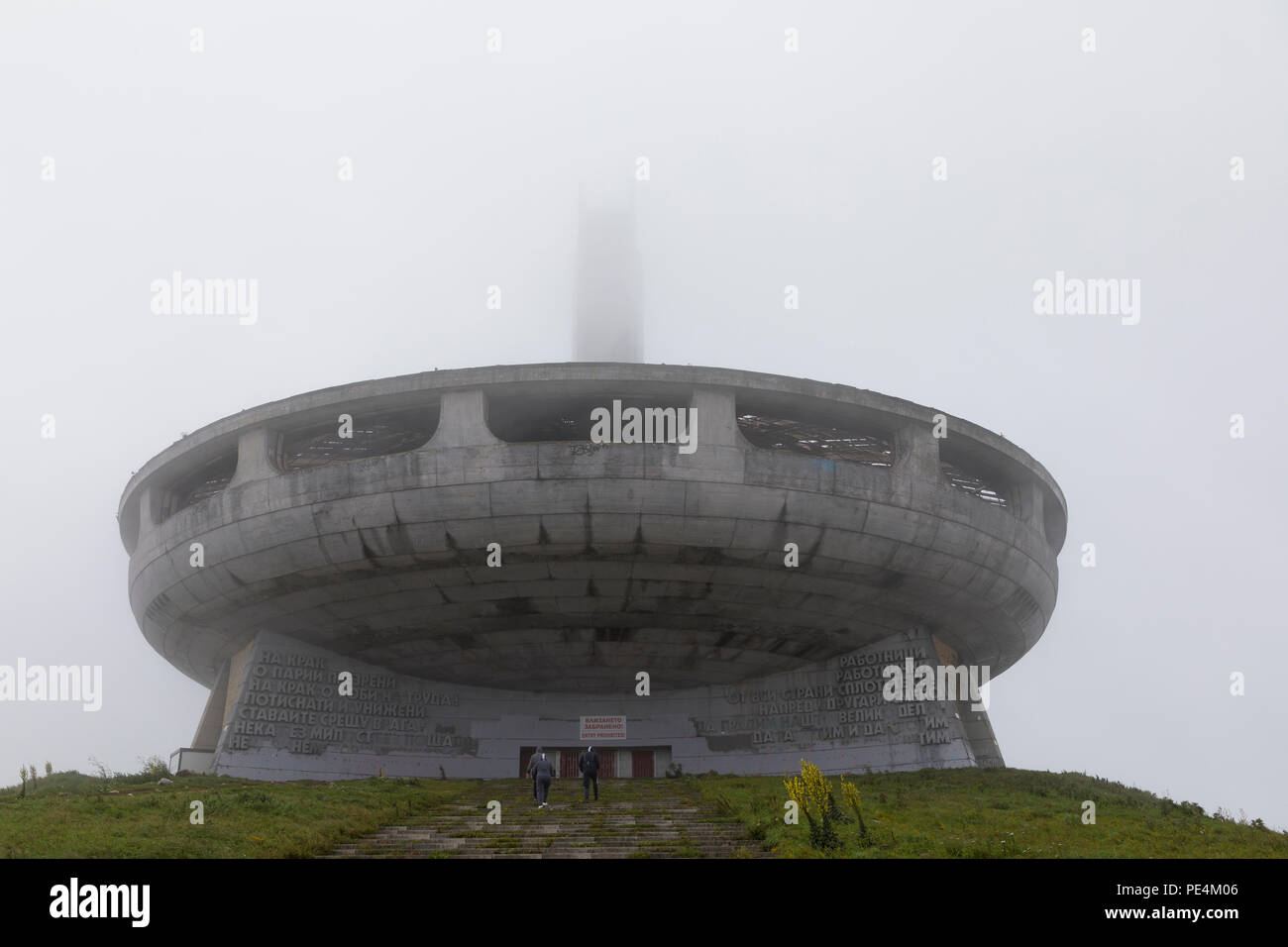 Abandoned communist monument Buzludzha  in the mist, Bulgaria Stock Photo