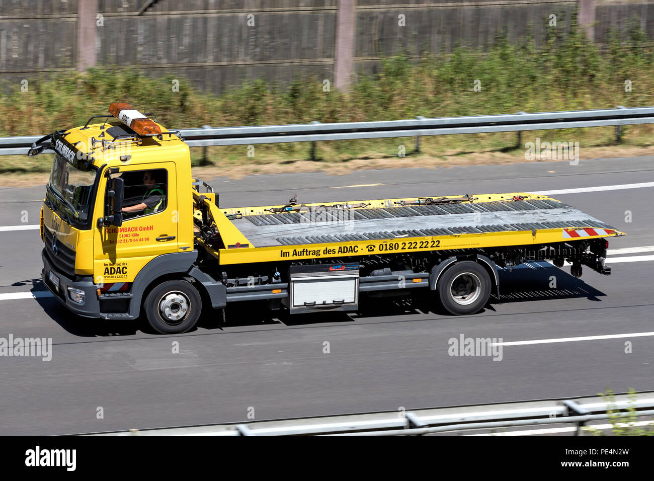 Flatbed Tow Truck Hooks Up a Truck Stock Photo - Image of pickup, towing:  6222220