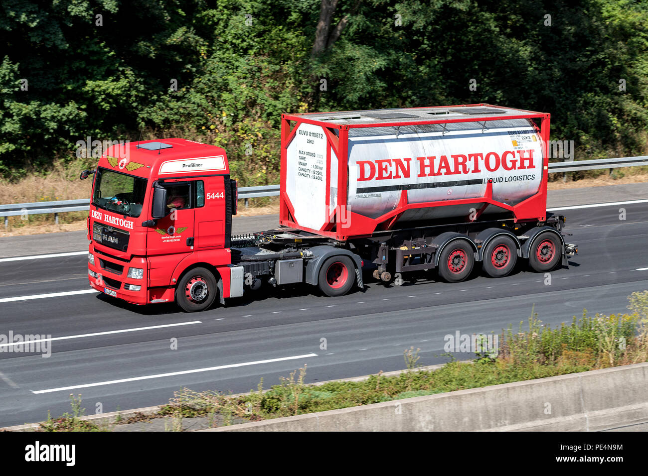 Den Hartogh truck on motorway. Den Hartogh is family-owned organisation that was established in 1920 and is headquartered in Rotterdam, Netherlands. Stock Photo