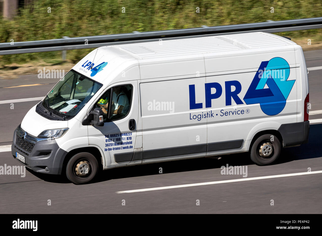 LPR van on motorway. As an owner-managed, medium-sized enterprise, LPR specializes in intelligently combining service and logistics concepts. Stock Photo