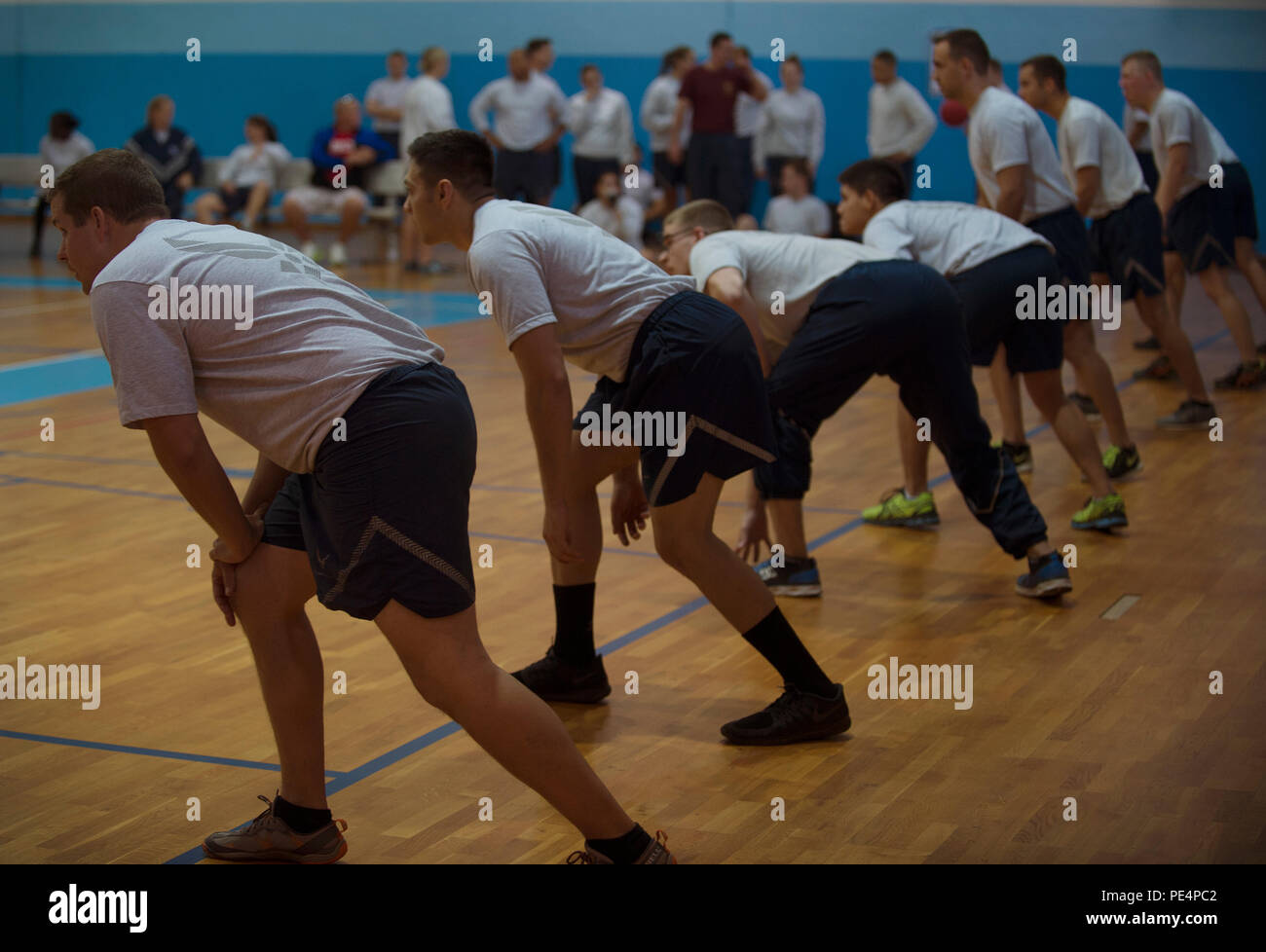 Airmen line up to prepare for a dodgeball match during the Commander’s Challenge Sept. 9, 2015, at Ramstein Air Base, Germany. The 86th Civil Engineer Squadron placed first for this tournament as well as in the overall Commander’s Challenge. (U.S. Air Force photo/Airman 1st Class Larissa Greatwood) Stock Photo